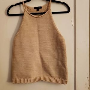 Banana Republic beige sleeveless halter tank sweater. It is a medium. NBW